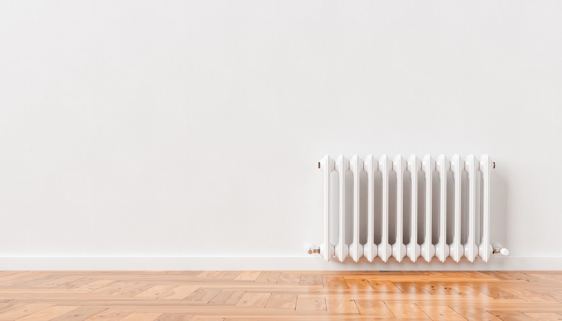 3D heating radiator on white wall at home